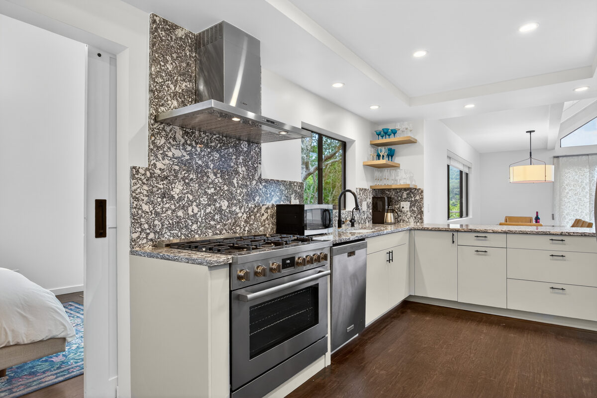 Primary finished-room view of mill valley painted kitchen cabinetry and surrounding surfaces