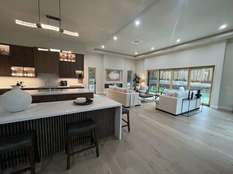 Walnut kitchen with fluted island detail — DodiHome